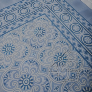 Medium blue and gray cement tiles in a pattern from Cuba.